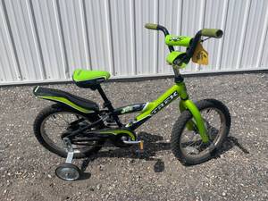 lot 57 image: Trek Black Green Bicycle 16 Wheels