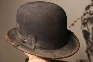lot 109 image: Antique bowler hat from the Model Clothing House in Minneapolis