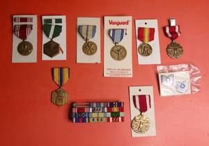 lot 55 image: 10 piece set of military medalsmedallions