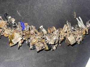 lot 87 image: Impressive Overloaded Charm Bracelet Antique, Vintage, international Collection of charms