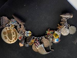 lot 89 image: Fancy Charm Bracelet With Antique International and Vintage Charms