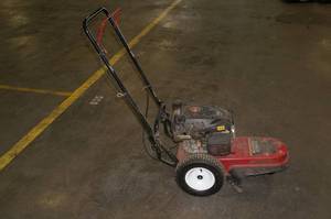lot 8 image: Fields Edge M200 173cc Gas Walk Behind String Trimmer
