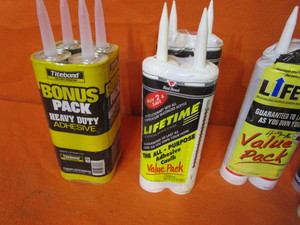lot 120 image: Misc. Caulk & Caulk Guns