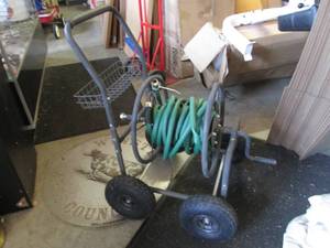 lot 51 image: Rolling Garden Hose Caddy with Hose...