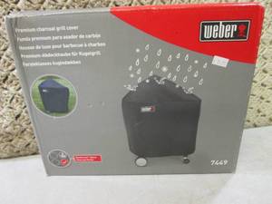 lot 93 image: Weber Premium Charcoal Grill Cover ...