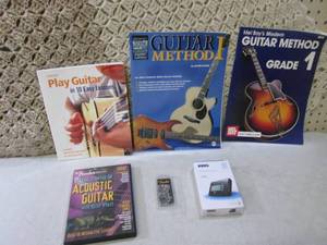 lot 157 image: Learn Guitar Books, DVD, Korg Guita...