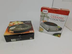 lot 114 image: Parini New Electric Ceramic Cooktop  Kaiser Noblesse Springform Pan