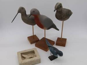 Wooden bird sculptures