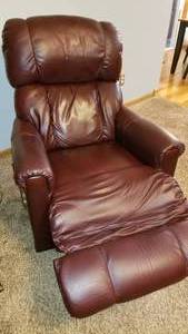 lot 79 image: Cordovan Recliner Rocking Chair