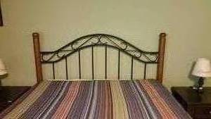 lot 70 image: Wood Post and Swirling Iron Queen Headboard
