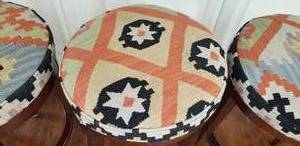 lot 17 image: Pottery Barn Kilim Upholstered Swivel Counter Stools
