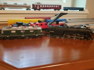 lot 64 image: Collection of Old Toy Trains and Train Tracks