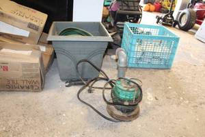 lot 84 image: Peabody Barnes Water Pump with Hose