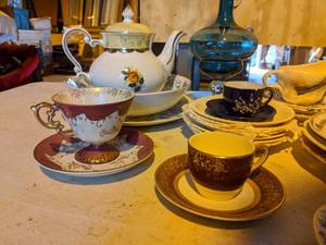 lot 138 image: Lot of Tea Cups & Saucers, Collector and Decorative Plates, and More