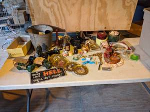 lot 25 image: Lot of AVON Collectible Decanters, Earrings, Matchbooks, and more