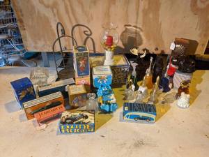 lot 42 image: Lot of AVON Collectible Decanters and More
