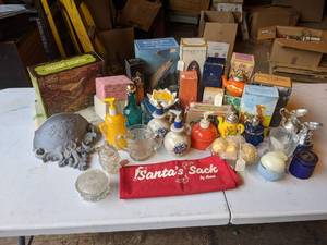 lot 43 image: Lot of AVON Collectible Decanters and More