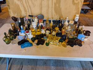 lot 179 image: Lot of AVON Collectible Decanters and More
