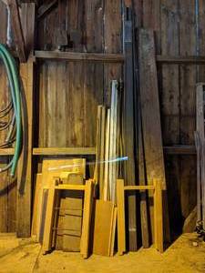 lot 94 image: Lot of Lumber, Trim, and Downspouts