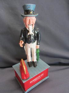 lot 130 image: Cast Mechanical Bank