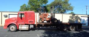 1998 International 9200 22 Foot Flatbed Semi Stretch 51,000 GVW Truck With Moffett M5000 Forklift