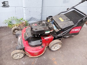 lot 406 image: Toro  30 in Timemaster Dual Force Lawn Mower.