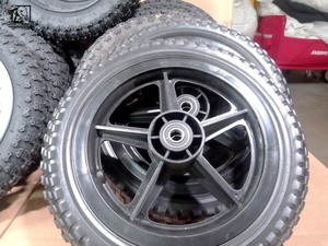 lot 529 image: 12 Inch Pneumatic Spoke Tires