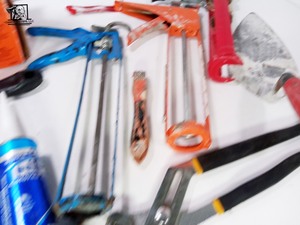lot 467 image: Black and Decker Sander, Gutter Seal, Caulk Guns, and Plaster Tools