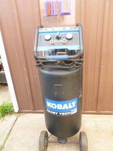 lot 8 image: Kobalt 30 gallon upright ultra quiet air compressor. Lightly used. Tested & works. As shown.