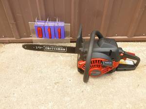lot 11 image: Craftsman 16 gas chainsaw. Lightly used. Tested & works. As shown.