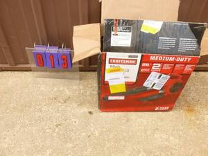 lot 13 image: Craftsman 2 cycle leaf blower. Appears nearly new. Tested & works. As shown.