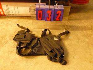 lot 32 image: Nylon shoulder holster. As shown.