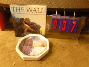 lot 37 image: Hard cover book & plate about Vietnam Memorial wall. As shown.