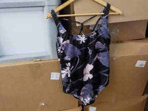 lot 228 image: size XL Shorts and Swimsuit, Dress...