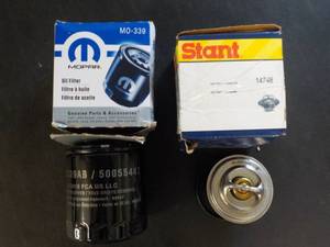 lot 276 image: Oil Filter and thermostat...