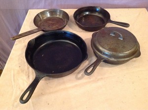 lot 108 image: Griswold Pan with Cover & Other Cast Iron Pans