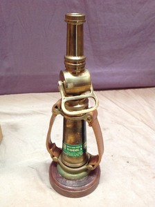 lot 199 image: Fire Hose Nozzle Alcohol Bottle