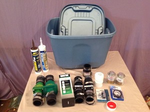 lot 306 image: Plumbing Supplies, Check Valves & Tote