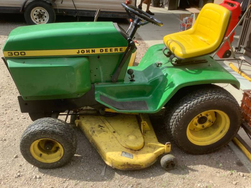 John Deere 300 Lawn Tractor Tiller Clearwater Moving Sale K BID