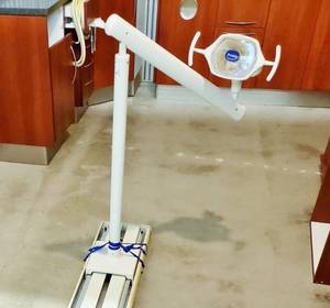 lot 5 image: MSRP $3500 2014 Proma A5150&nbspDental Track Mount Patient Exam Procedure Overhead Light - Excellent Condition - Please See&nbspAttached&nbspInstallation PDF For More Details Please See Picture With Actual Invoice