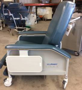 lot 25 image: MSRP $1600 Graham Field Medichoice Lumex Deluxe Clinical Care Recliner,Extra Wide Seat With Flip Up Side Tables - 450lb Capacity&nbspMultiple Positions for Enhanced Patient Comfort Very Nice Condition With Exception Of Wear To Back Of One Arm -See Pic