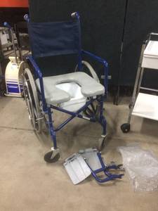 lot 45 image: MSRP $850 Invacare  Self Propelled Rehab Shower Commode Chair 300lb Capacity -&nbspFolds For Easy Storage - Corrosion-Resistant, Powder Coated Aluminum Frame & Stainless Steel Hardware, Making It Ideal For Shower Use - Nice Condition 