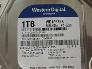 lot 9 image: WD Blue WD10EZEX 1TB SATA 3 Interna...