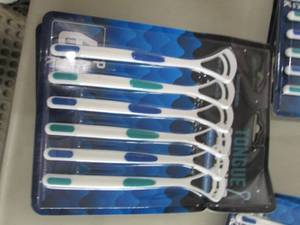 lot 28 image: 9- 6pk Tongue Cleaners...