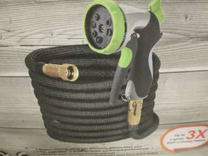 lot 48 image: 100 ft Hose & Nozzle...