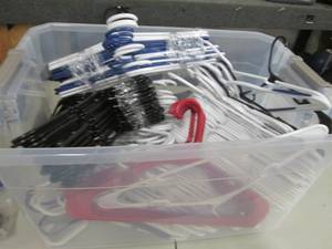 lot 129 image: Tote of Plastic Hangers...