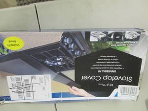 lot 244 image: RV & Marine Stovetop Cover...
