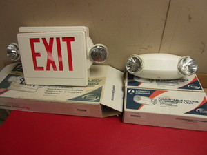 lot 147 image: EMERGENCY LIGHTS, INCLUDING LED EXITUNIT COMBO AND ADJUSTABLE OPTICS EMERGENCY UNITS