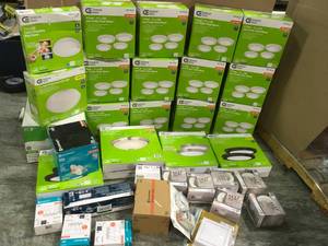 lot 39 image: 12 CASES OF COMMERCIAL ELECTRIC 11 in. White Integrated LED Flush Mount (4-Pack) & OTHER LIGHTS THIS ALSO HAS ECOSMART LIGHT BULBS CUSTOMER RETURNS SEE PICS