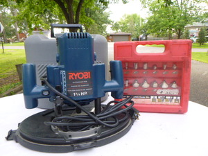 lot 133 image: Ryobi Plunge Router & Carbide Router Bits
